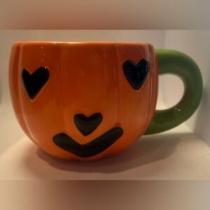 Sandra Magsamen | Oversize Pumpkin Happy Halloween mug.